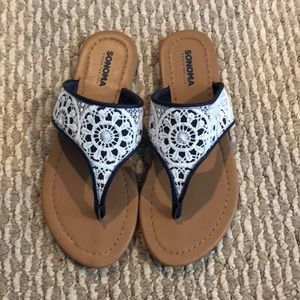 Navy blue and white sandals
